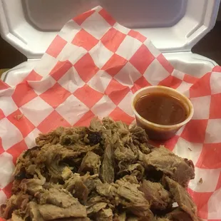 The pulled pork was perfect: smoky flavor, good bark, and a nice pink smoke ring. The sauce is a tomato-vinegar mop sauce.