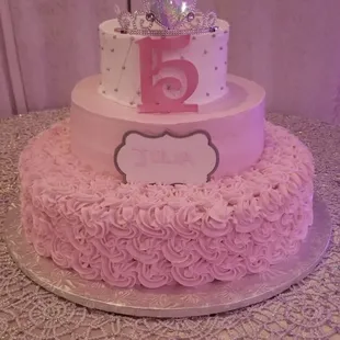 a pink and white cake