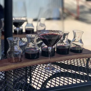 a variety of wine glasses on a table