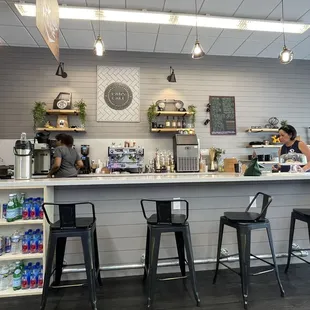 a woman sitting at the counter