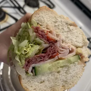 Create Your Own Deli Sandwich with 1-2 Meats  (Turkey, pastrami, lettuce, cucumber, roasted red pepper, oil &amp; oregano)