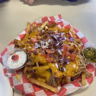 Pulled pork fries, yummy. Two people can split this easily.