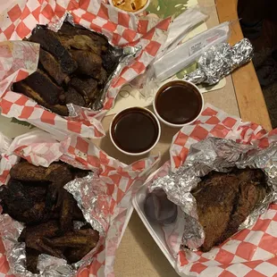 Slab of ribs, pound of brisket, and order of 8 wings.