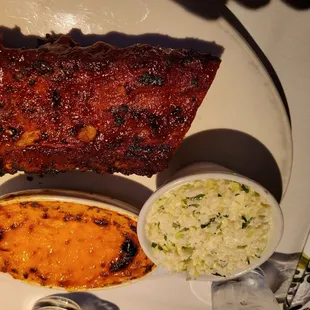 a plate of ribs and sides