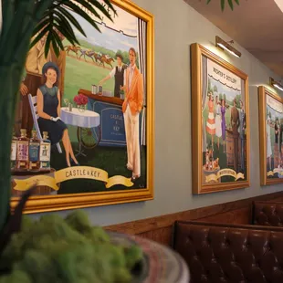 3 of the featured &quot;Memory Maker&apos;s&quot; mural that spans the walls of the restaurant.