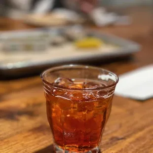 a shot of a drink on a table