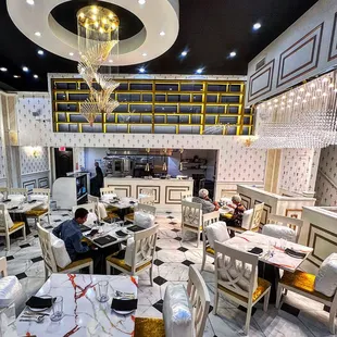 a dining room with a chandelier