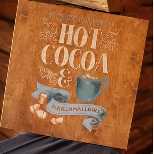 a hot cocoa and marshmallows sign