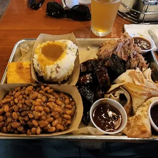 Three meat platter - burnt ends, pulled pork, smoked turkey. Three different sauces. Tasty and filling! Nice staff and environment.