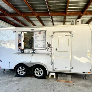 a food truck parked in a garage