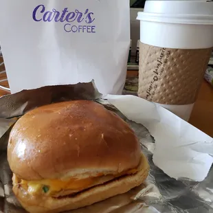 Egg &amp; cheese breakfast sandwich w/Sriracha mayo and chives on a Hawaiian sweet roll.