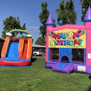 Rainbow water slide.  Happy birthday Bounce Houses .