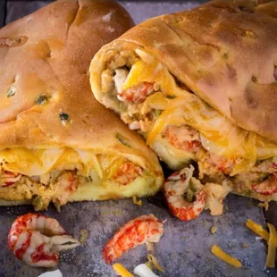 a close up of a sandwich cut in half