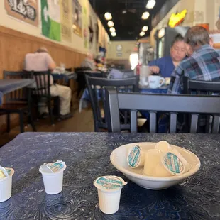 a table with cups of coffee