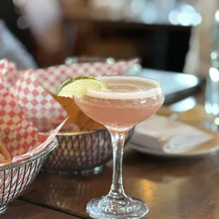 Flirtini martini. Good as it is. Second round we 86ed the Prosecco. On return trip, we did the same. Delicious. Recommended.