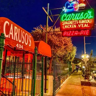 a neon sign for a restaurant