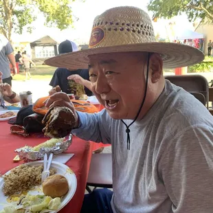 Attempting to eat that turkey leg!!