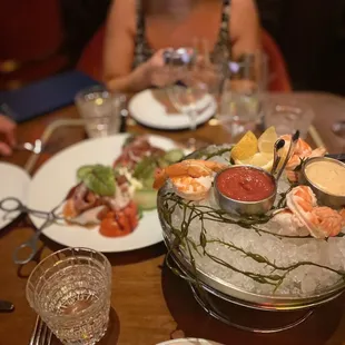 Shrimp cocktail and burrata.