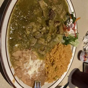 Carne en Chile verde ( pork ) bomb lite spice nothing overwhelming.