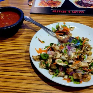 Complimentary chips, salsa and mushroom relish