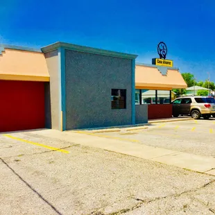 a car parked in front of a building