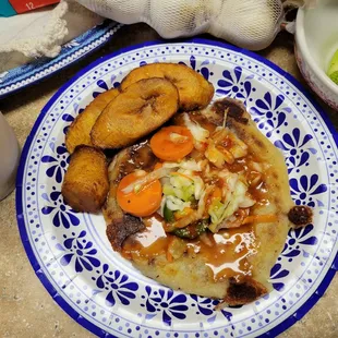 Bean and cheese and pork with picked slaw fried plantains