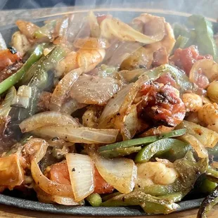 Sizzlin&apos; happy and sassy on this gloomy Friday afternoon. It&apos;s a yes to Shrimp Fajitas. Mr. C highly recommends!