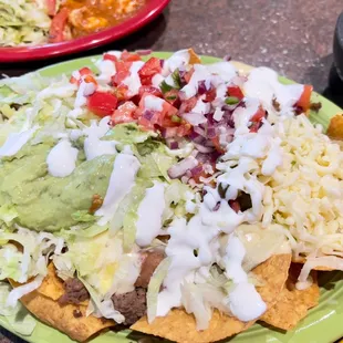Today&apos;s special: Nachos Supreme. Excellent with fresh ingredients!