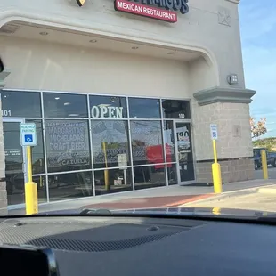 Front view. Zoom in to see the advertising on the windows. They have a Happy Hour, and Free Guacamole made fresh at your table (5-11pm).