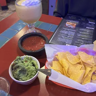 mexican food and drinks on a table