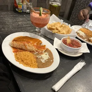 #9 on the menu: burrito, tamale, rice, and beans. Strawberry margarita, beer, chips and salsa