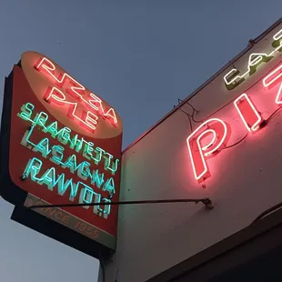 Neon sign above front door