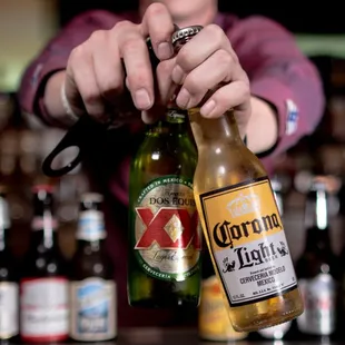 a bartender pouring a beer