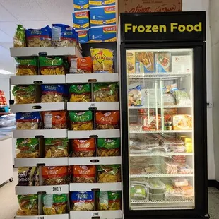 Small frozen food case &amp; dried plantain strips of various flavors.