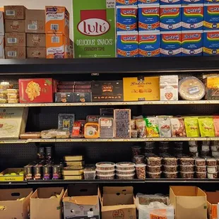 Refrigerated foods. Produce in boxes at the bottom.