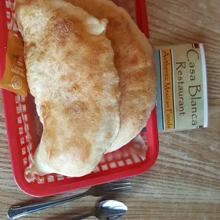 a basket of food and a fork