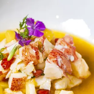 a bowl of lobster and vegetable soup