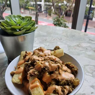 bori fries. yuca loaded fries with vegan beef