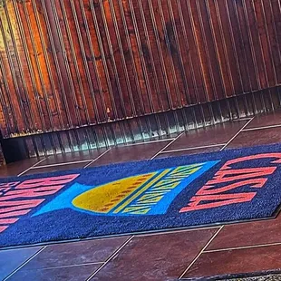 floor mat as you enter the restaurant