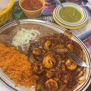 Fajitas in the background, shrimp Diablo on the forefront