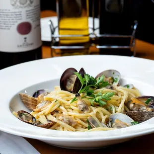 a plate of pasta with clams