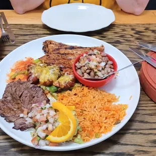 The Casa Especial. Grilled steak, chicken and bacon-wrapped shrimp with all the trimmings.