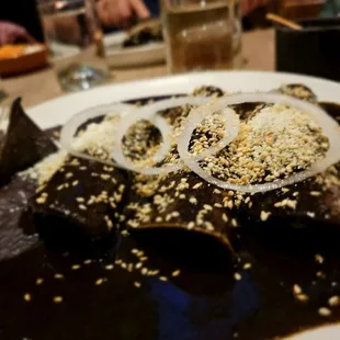Enmoladas Xico. $28. Excellent mole though a different type than I am used to. With chicken/pollo