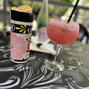 Hurricane cocktail and watermelon margarita