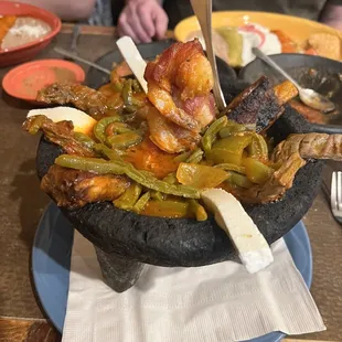 a large bowl of food on a table