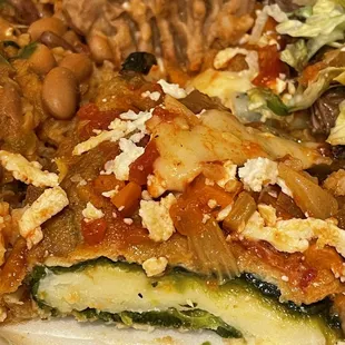 Leftover Chile Relleno. That is about 4 inches across, loaded with cheese inside and also quite a bit on the outside of the relleno.