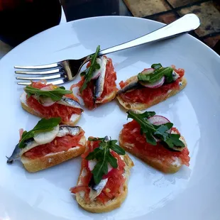 Anchovies with tomato tartine with goat cheese. So refreshing