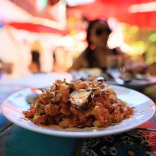 Pulpo De La Casa!  It's SOOO GOOD! Grilled octopus with chorizo! Photo by https://www.instagram.com/sureshotcreative/
