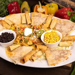 a plate of quesadillas and salsa