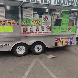 a food truck parked in a parking lot